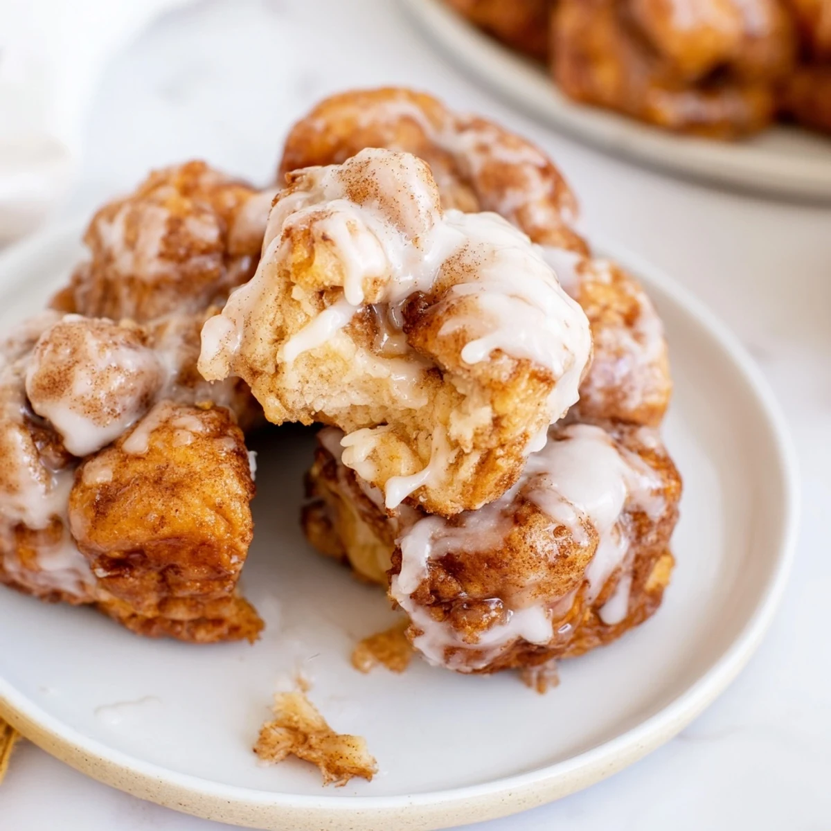 Golden high protein no sugar monkey bread with cinnamon coating in bundt pan