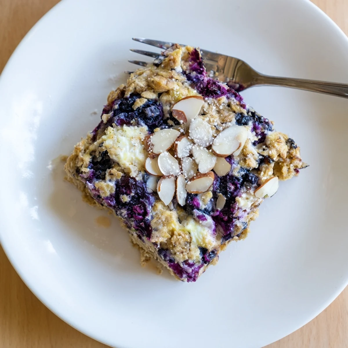 Golden blueberry cottage cheese breakfast bake with tender oats and juicy fruit