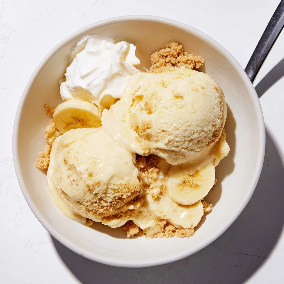 Homemade Ninja Creami Banana Cream Pie Ice Cream with buttery graham crunch