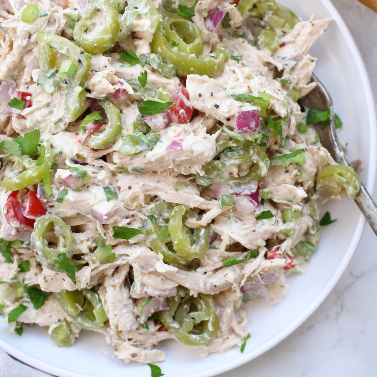 Weeknight High Protein Pepperoncini Chicken Salad stuffed into whole grain wraps, ready to eat